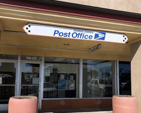 The front of a Post Office.