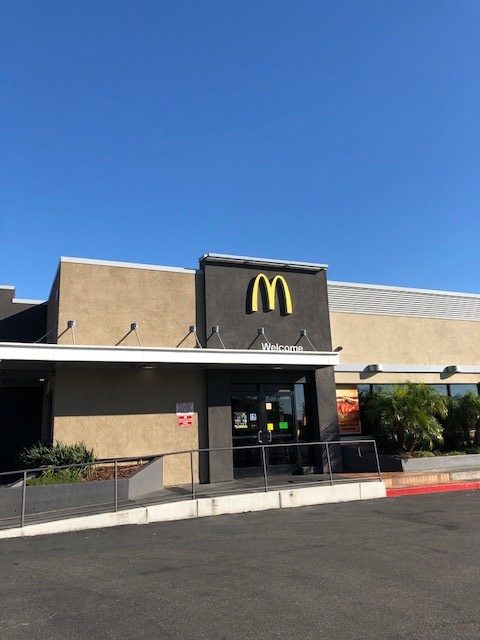 The front side of a McDonald's restaurant.